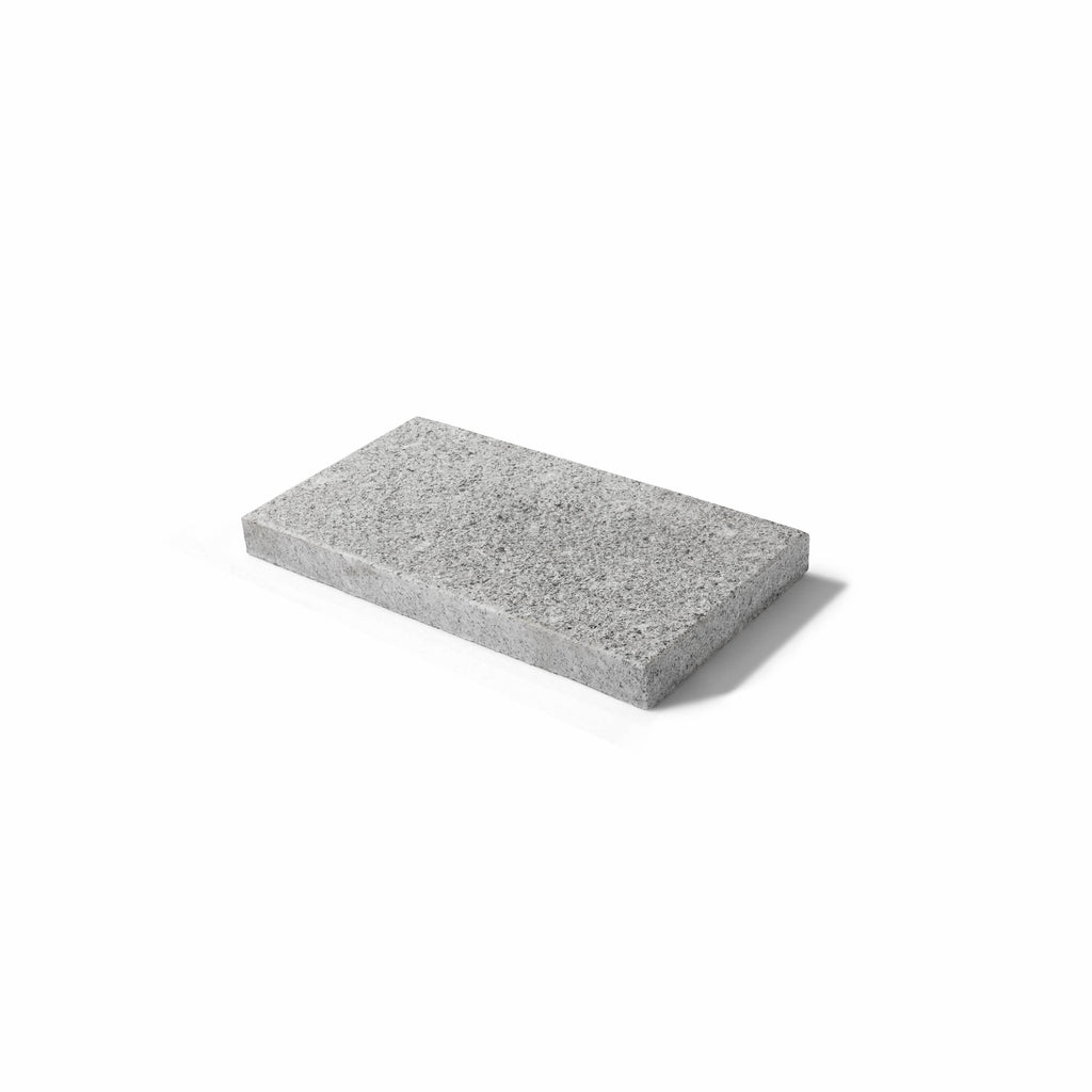 Grå granitplatta från Portugal. 57x38x3 cm. Stengrossen