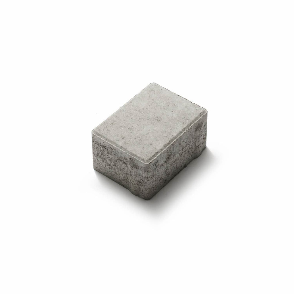 Munksten från S:T Eriks. Storleken är 105x140x70 mm. Färgen är Naturgrå. Artikelnummer är 9510-070300. Säljs av Stengrossen